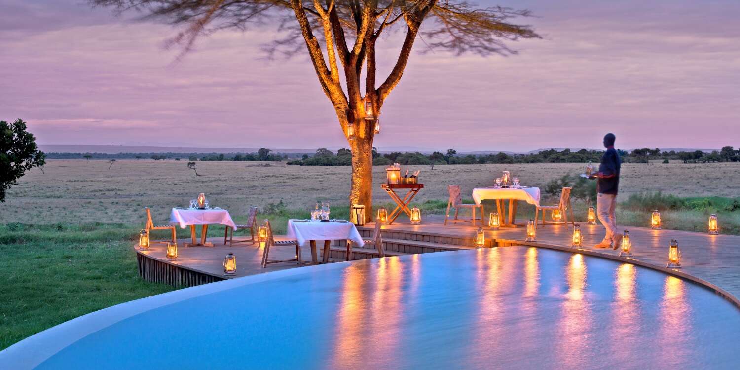 Poolside safari dining at dusk